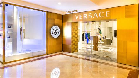 versace business profitability.